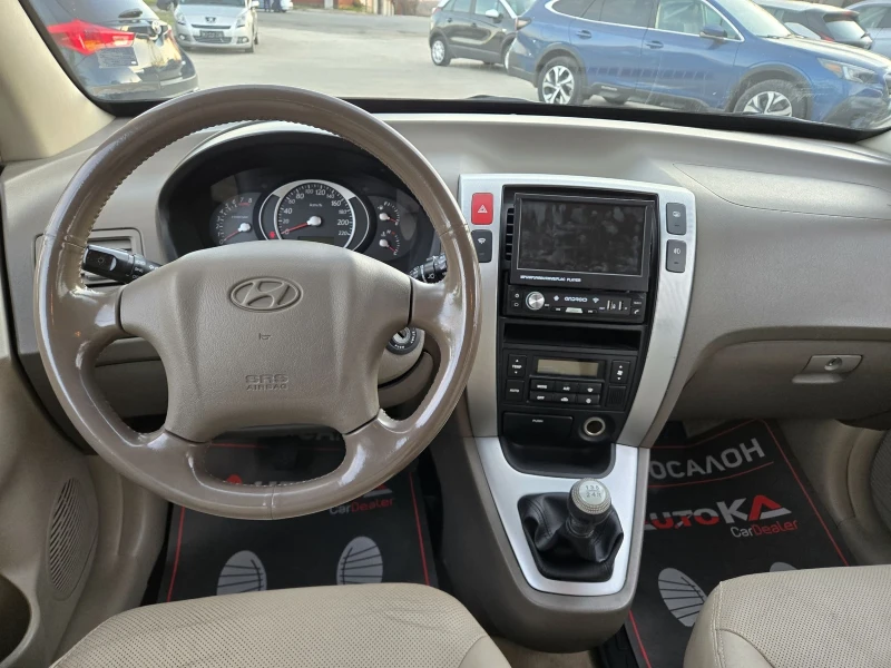 Hyundai Tucson 2.0i-141кс= ГАЗ= 4Х4= НАВИ= ОБСЛУЖЕН= КЛИМАТРОНИК, снимка 11 - Автомобили и джипове - 52850575