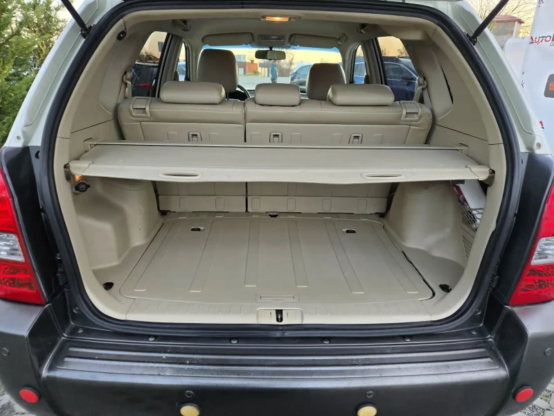 Hyundai Tucson 2.0i-141кс= ГАЗ= 4Х4= НАВИ= ОБСЛУЖЕН= КЛИМАТРОНИК, снимка 10 - Автомобили и джипове - 52850575