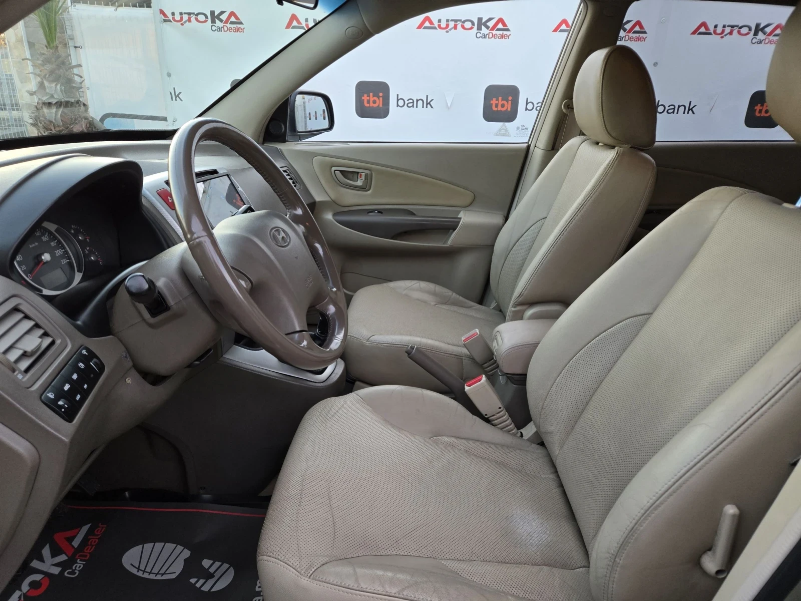 Hyundai Tucson 2.0i-141кс= ГАЗ= 4Х4= НАВИ= ОБСЛУЖЕН= КЛИМАТРОНИК - изображение 7