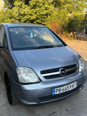     Opel Meriva 1.4 90.   2006