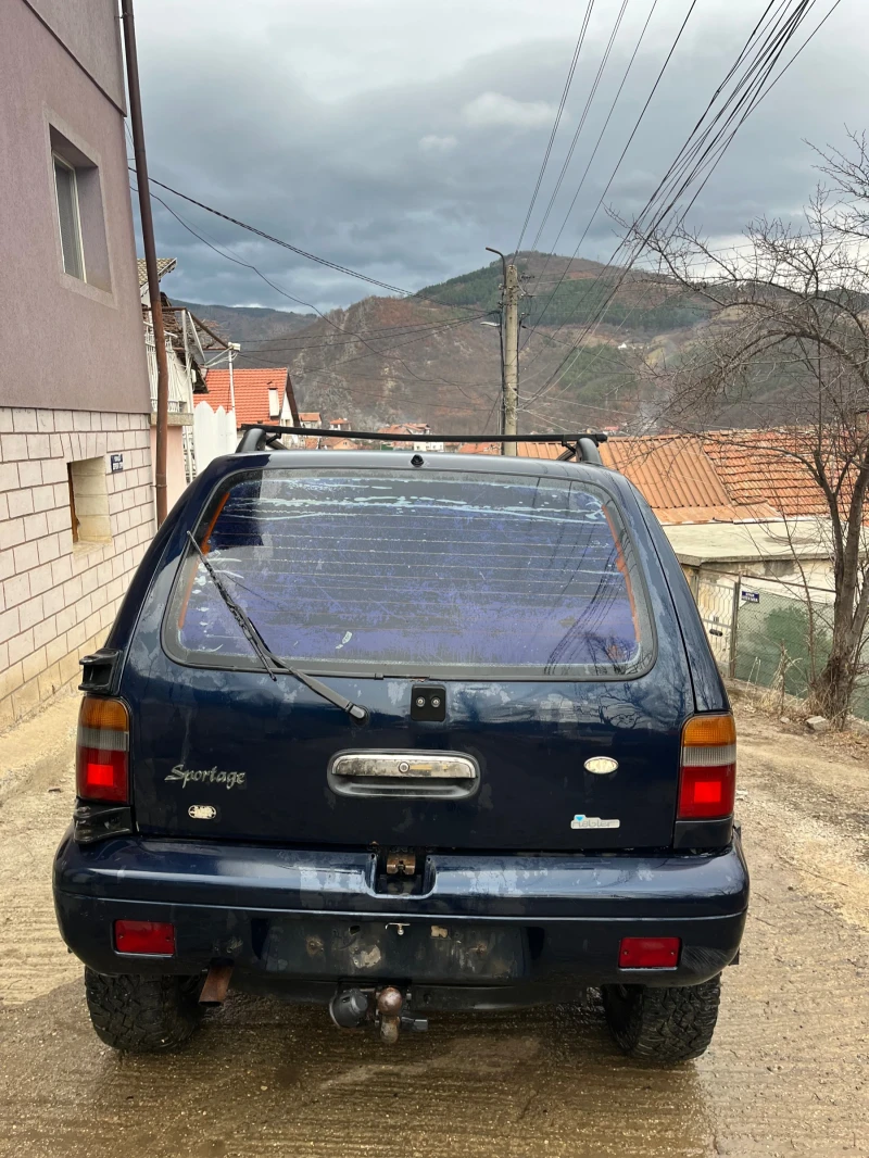 Kia Sportage, снимка 8 - Автомобили и джипове - 48912158