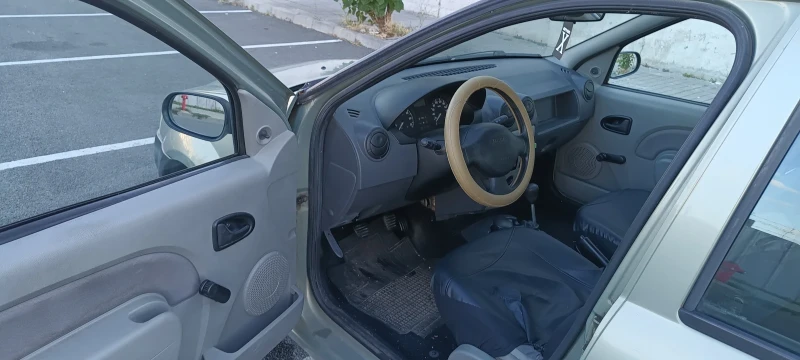 Dacia Logan 1.4 mpi, снимка 9 - Автомобили и джипове - 49538540