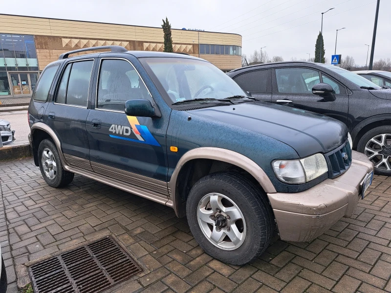 Kia Sportage 2.0i 4WD 118p.s 110х.км, снимка 3 - Автомобили и джипове - 49321971