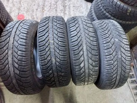 Гуми Зимни 235/65R17, снимка 1 - Гуми и джанти - 38496578