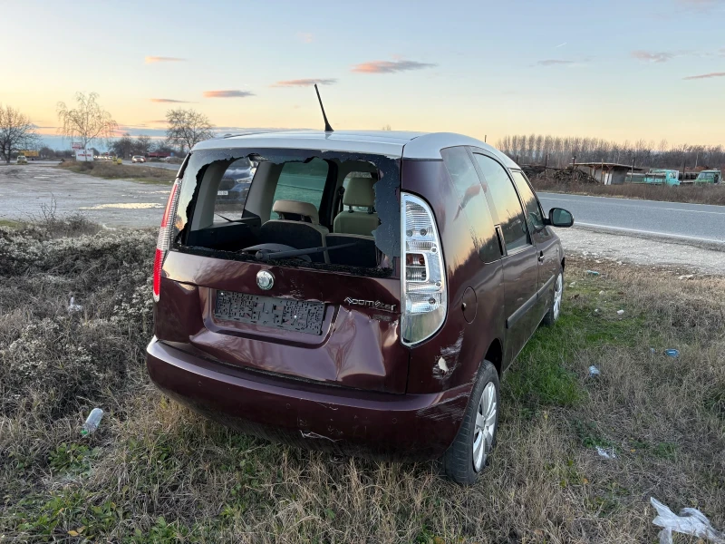 Skoda Roomster 1.6 TDI 105 кс Подгрев Климатроник Парктроник, снимка 5 - Автомобили и джипове - 52909279