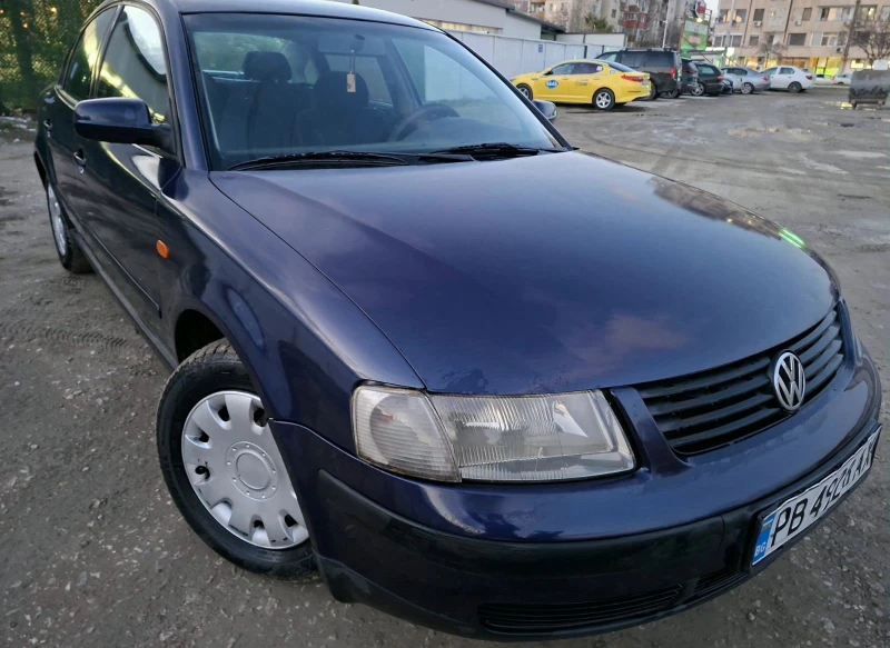 VW Passat 1.6 Газ Клима, снимка 11 - Автомобили и джипове - 53101377