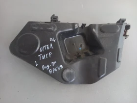 Водач държач предна броня ляв Опел Тигра 