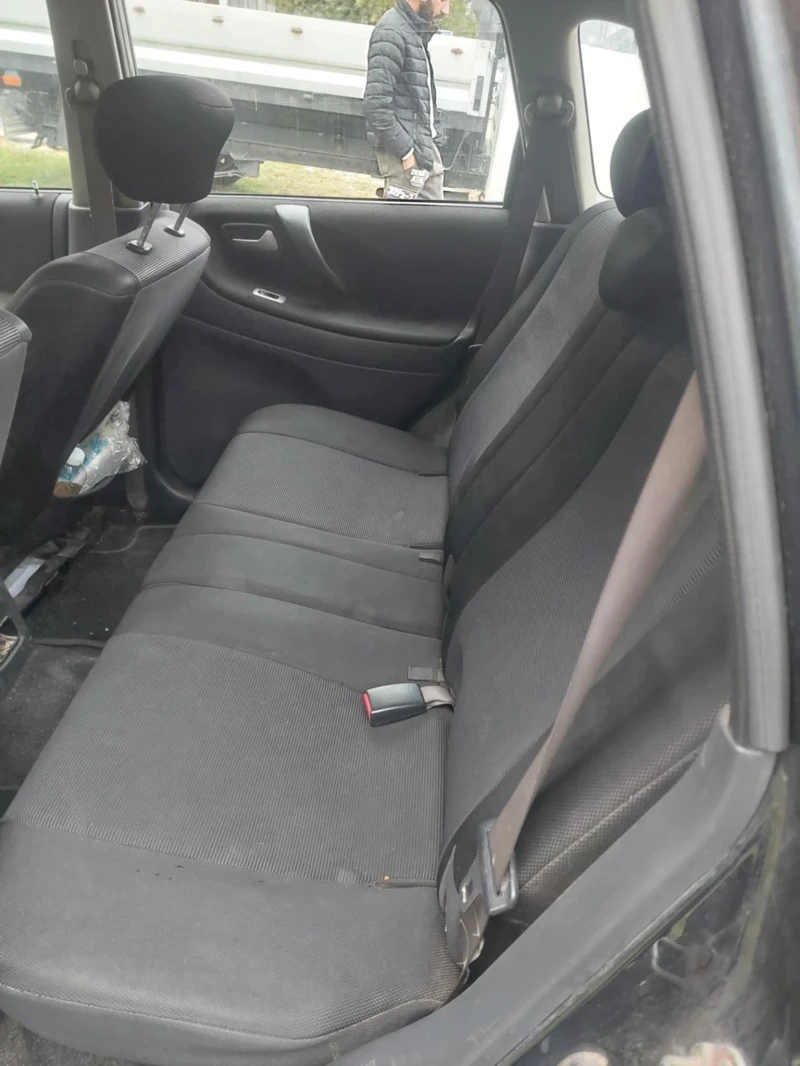 Suzuki Liana, снимка 4 - Автомобили и джипове - 52845821