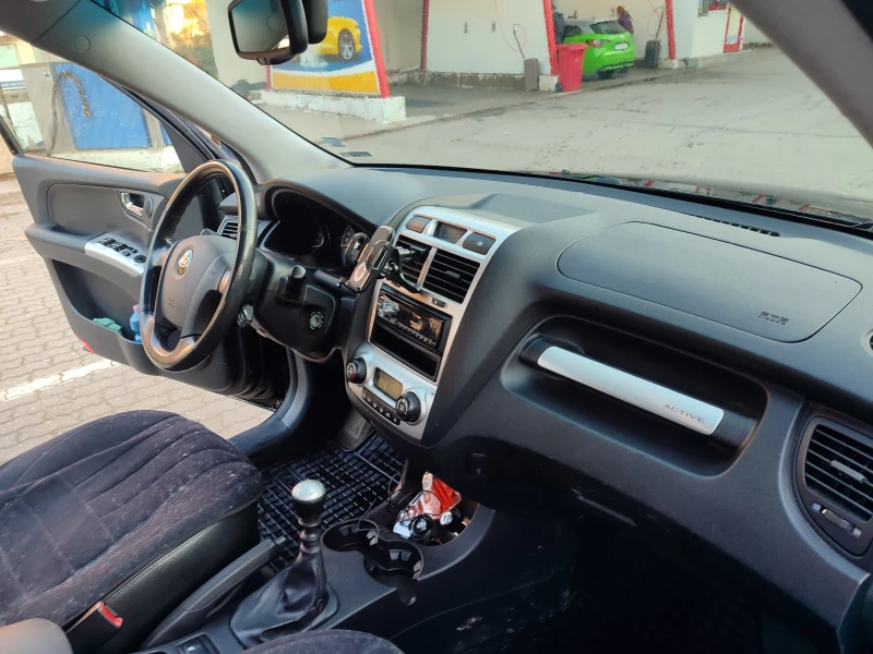 Kia Sportage, снимка 12 - Автомобили и джипове - 49586355