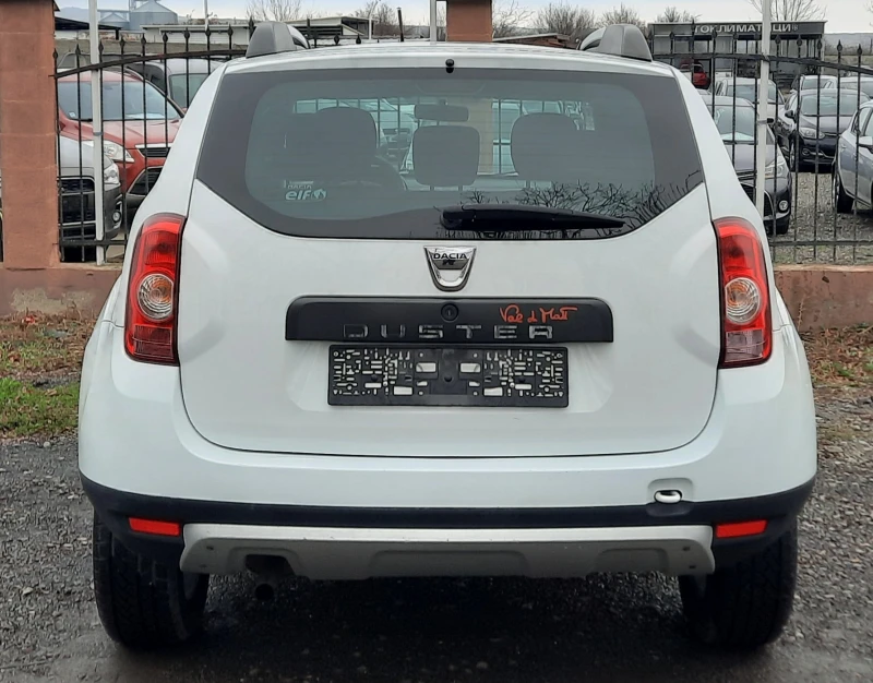 Dacia Duster 1.6i, снимка 5 - Автомобили и джипове - 49272986