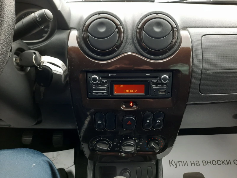 Dacia Duster 1.6i, снимка 10 - Автомобили и джипове - 49272986