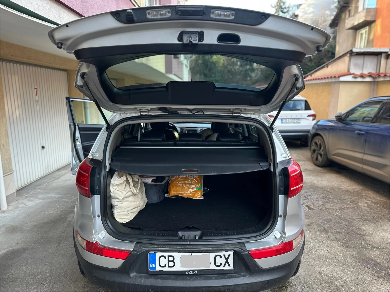 Kia Sportage 2.0 CRDI 4x4, снимка 4 - Автомобили и джипове - 54781560