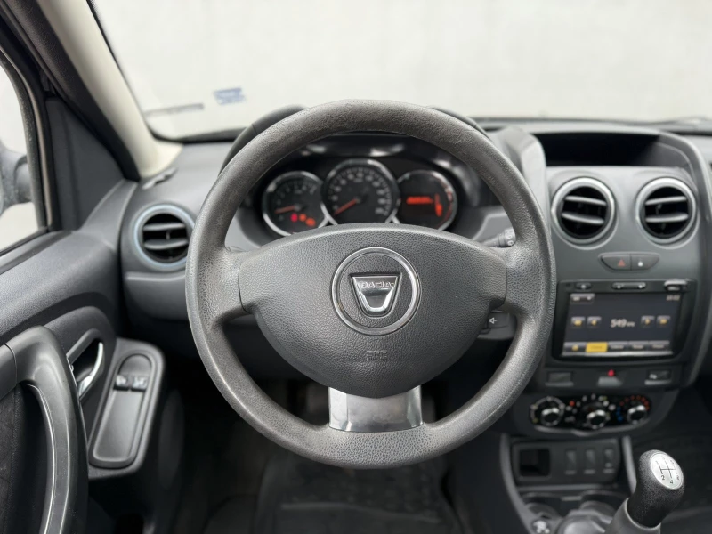 Dacia Duster 1.6 LPG, снимка 12 - Автомобили и джипове - 51201428
