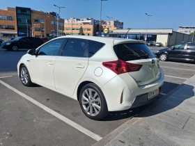 Toyota Auris 1.8 Hybrid, ниво Lounge, реален пробег, снимка 3
