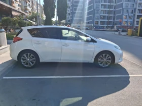Toyota Auris 1.8 Hybrid, ниво Lounge, реален пробег - 8300 € - 26550713 6