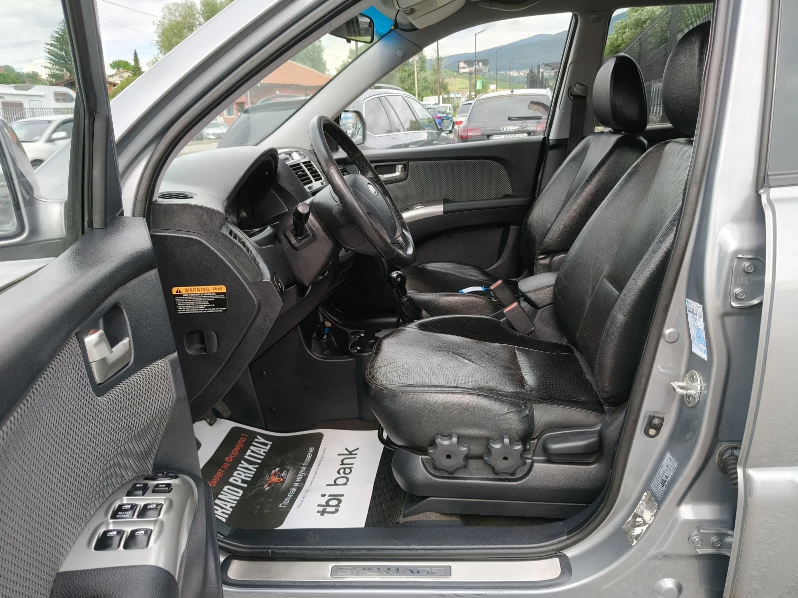 Kia Sportage 2.0i газ/бензин, снимка 9 - Автомобили и джипове - 55139562