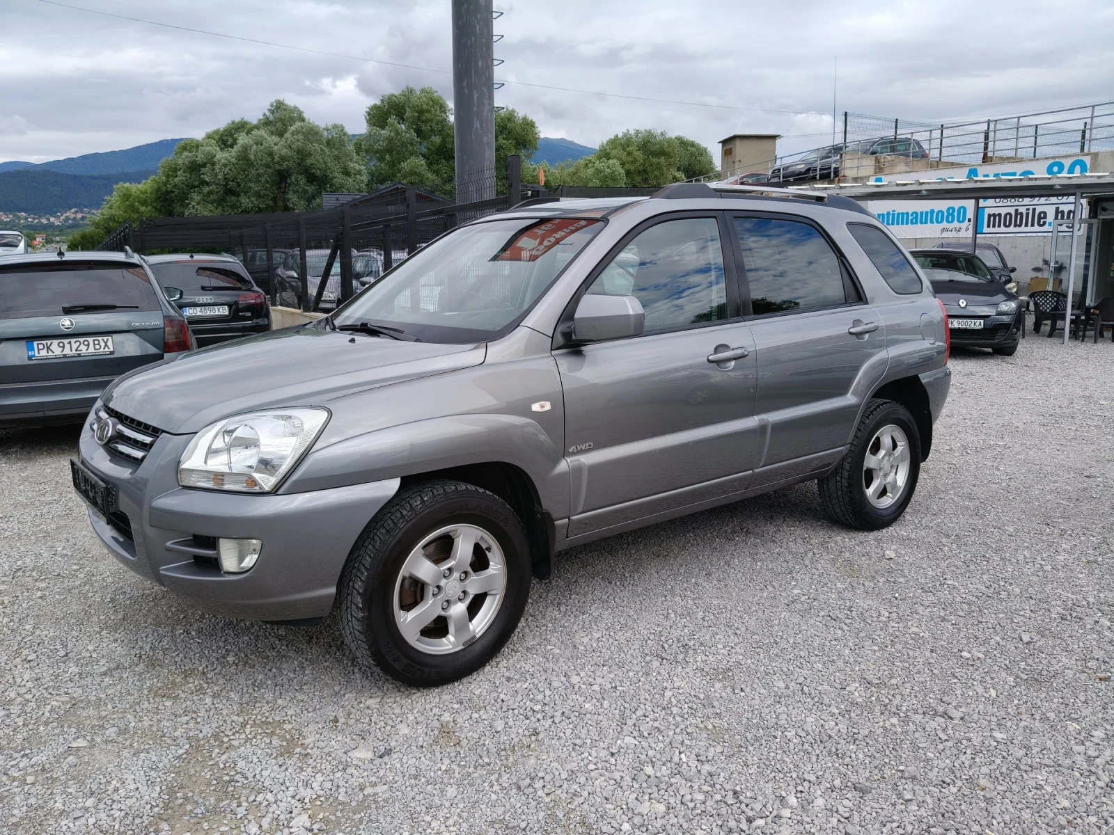 Kia Sportage 2.0i газ/бензин, снимка 3 - Автомобили и джипове - 55139562