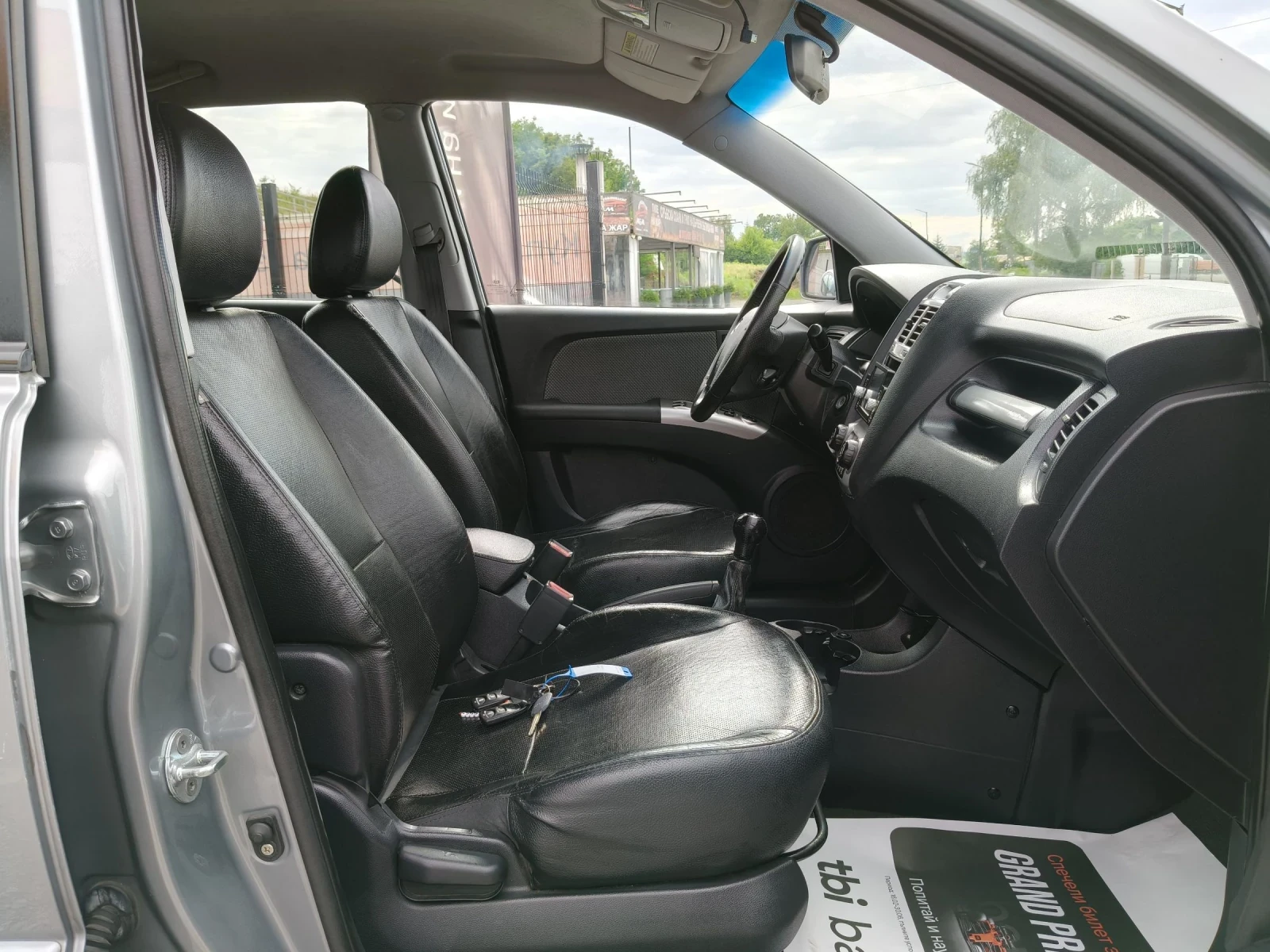 Kia Sportage 2.0i газ/бензин, снимка 12 - Автомобили и джипове - 55139562