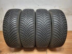 Гуми Зимни 215/65R16, снимка 1 - Гуми и джанти - 48762530