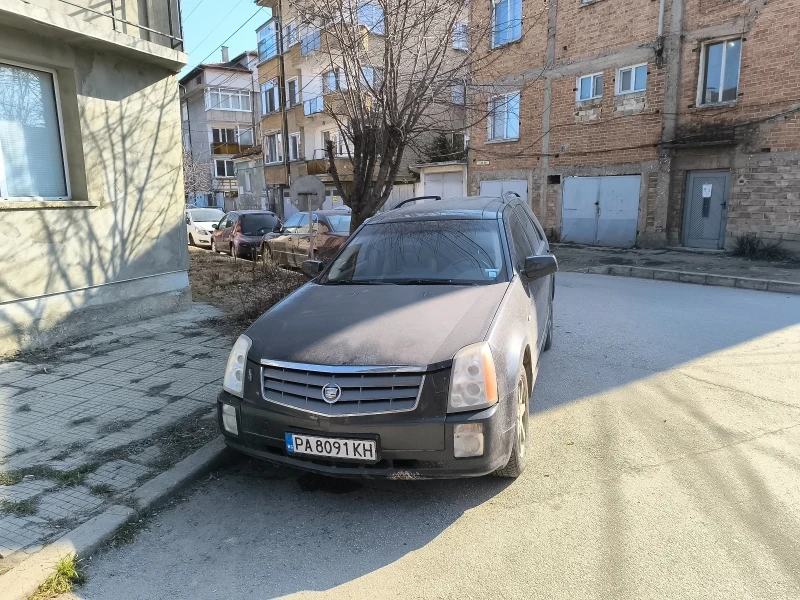 Cadillac Srx, снимка 1 - Автомобили и джипове - 48915092