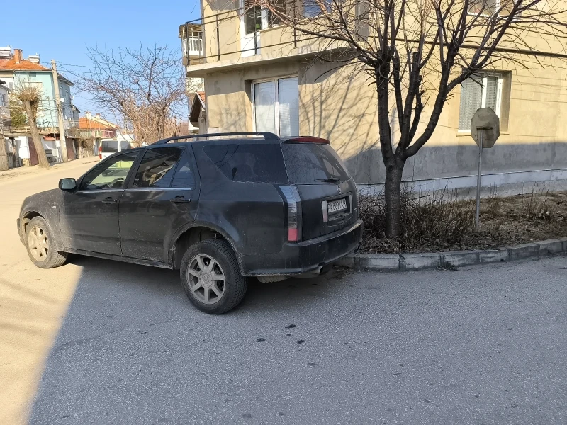 Cadillac Srx, снимка 2 - Автомобили и джипове - 48915092