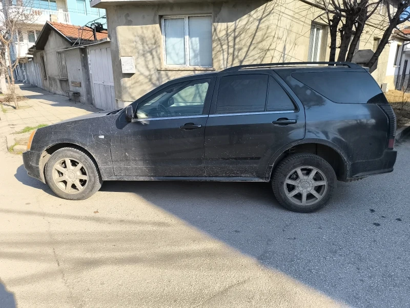 Cadillac Srx, снимка 4 - Автомобили и джипове - 48915092