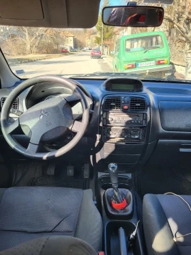 Mitsubishi Space star Мини ван