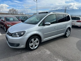 VW Touran 2.0 TDI DSG Highline Навигация, Панорама, 7 места  - 8300 € / 16233.39 лв. - 32086481 2