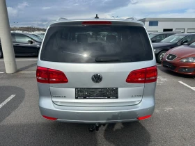 VW Touran 2.0 TDI DSG Highline Навигация, Панорама, 7 места  - 8300 € / 16233.39 лв. - 32086481 6