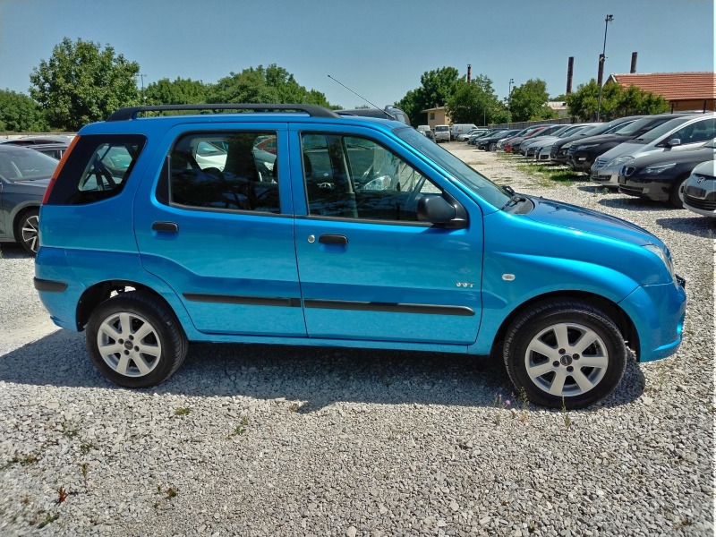 Suzuki Ignis 1.3 i 4x4 klima, снимка 4 - Автомобили и джипове - 46385211