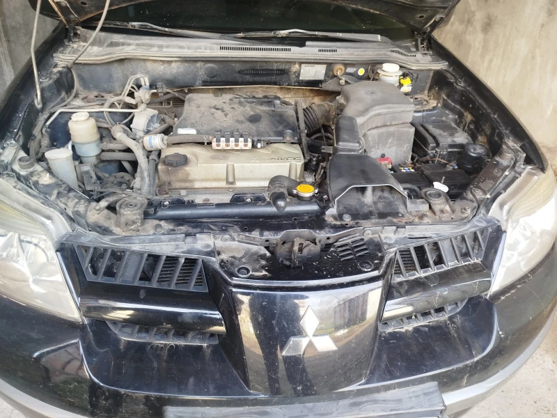 Mitsubishi Outlander MIVEC 4WD, снимка 14 - Автомобили и джипове - 53496460