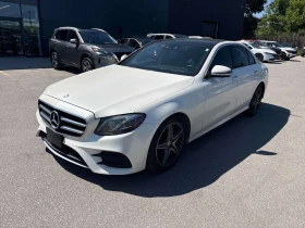 ������ Mercedes-Benz E 400