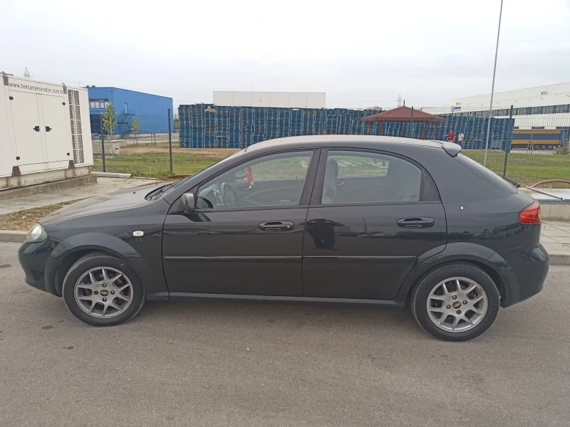 Chevrolet Lacetti 1.4 газ климатик, снимка 6 - Автомобили и джипове - 47184276