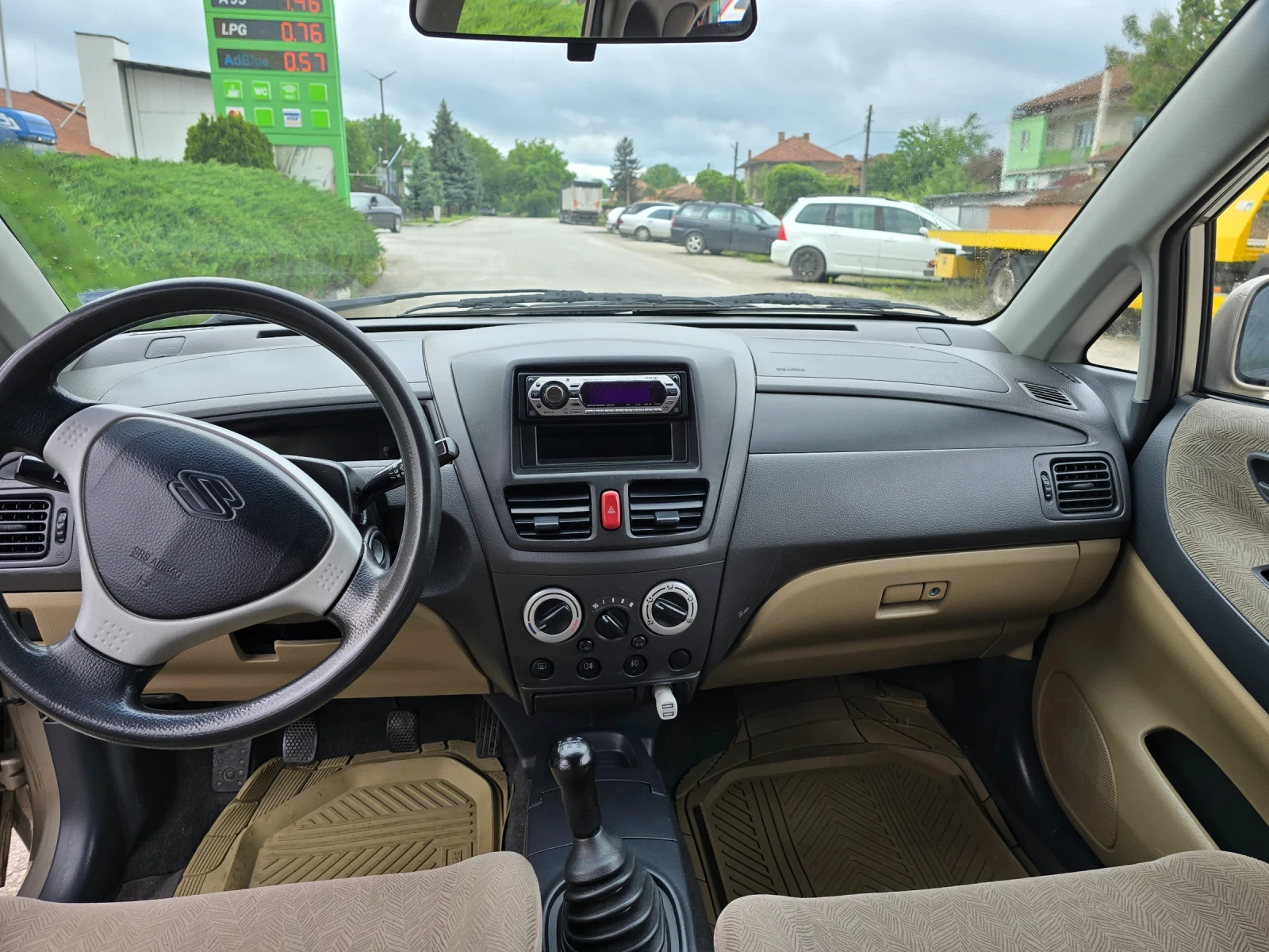 Suzuki Liana, снимка 16 - Автомобили и джипове - 54651201