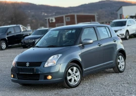 Suzuki Swift 1.3i 90к.с * 4х4* * Климатик* , снимка 1