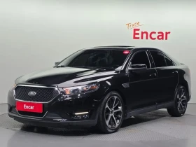 ������ Ford Taurus