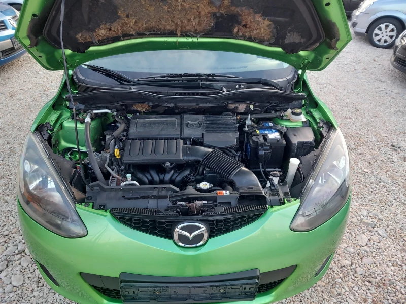 Mazda 2 1.4i климатик, снимка 15 - Автомобили и джипове - 48633322