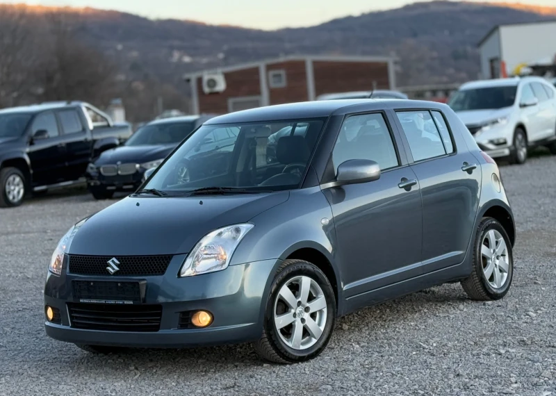 Suzuki Swift 1.3i 90к.с * 4х4* * Климатик* , снимка 1 - Автомобили и джипове - 48839053