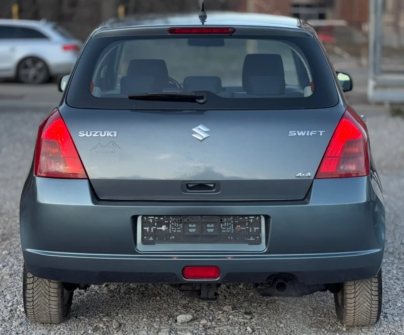 Suzuki Swift 1.3i 90к.с * 4х4* * Климатик* , снимка 5 - Автомобили и джипове - 48839053