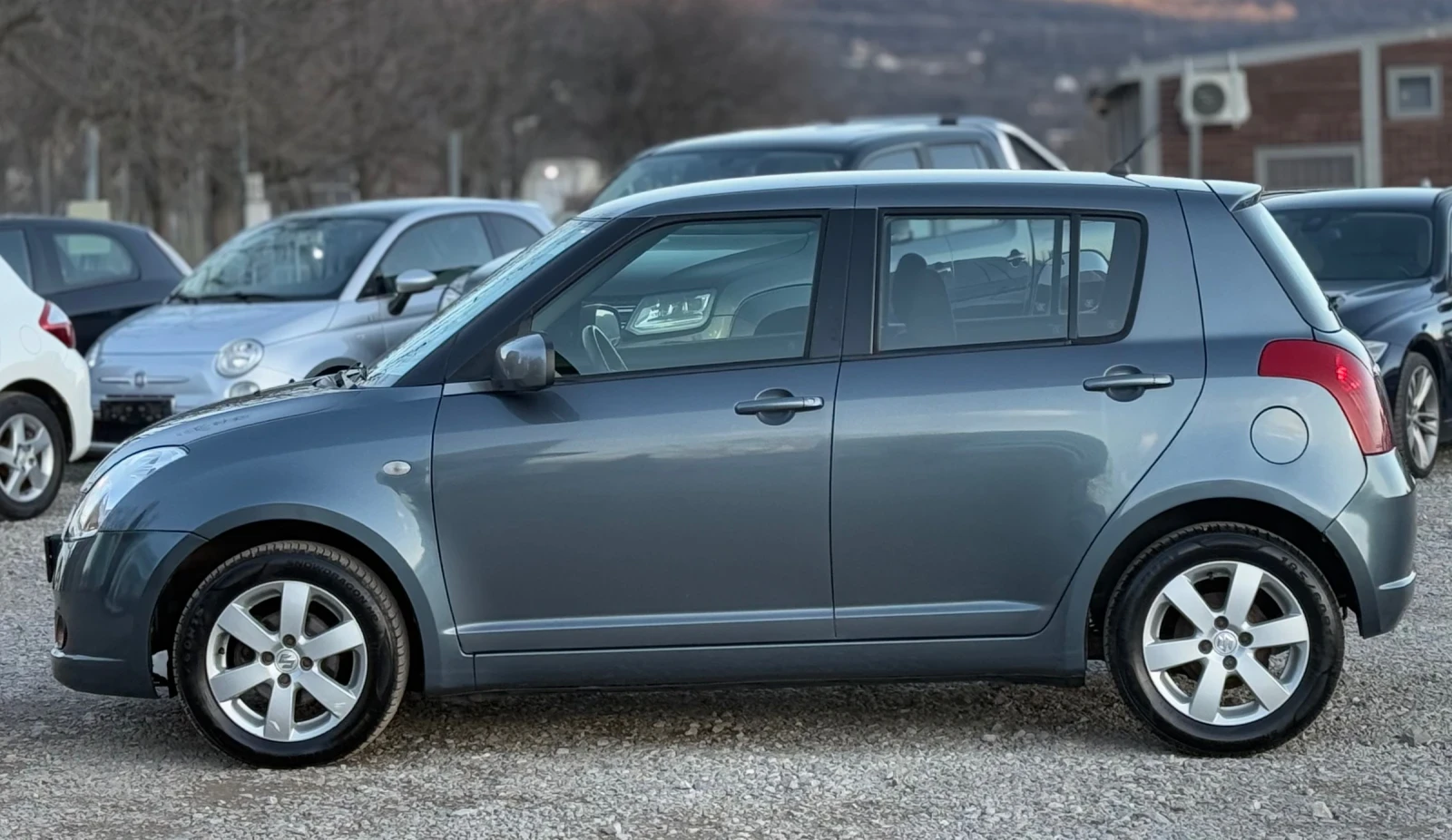 Suzuki Swift 1.3i 90к.с * 4х4* * Климатик*  - изображение 7