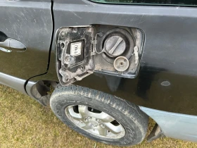 Mazda Tribute 2.0, снимка 11