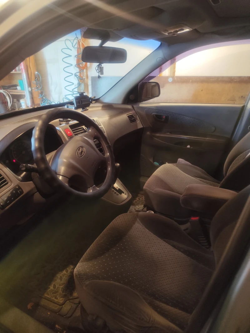 Hyundai Tucson 2.0 crdi, снимка 6 - Автомобили и джипове - 52919453