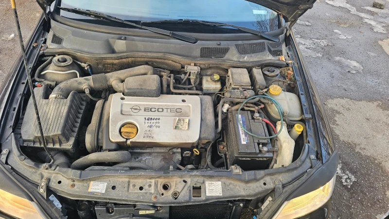 Opel Astra, снимка 14 - Автомобили и джипове - 48744387