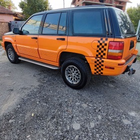 Jeep Grand cherokee 5.2 i * SWISS* TOP* , снимка 9