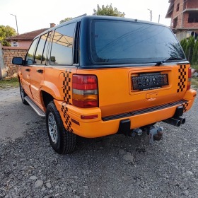 Jeep Grand cherokee 5.2 i * SWISS* TOP* , снимка 7