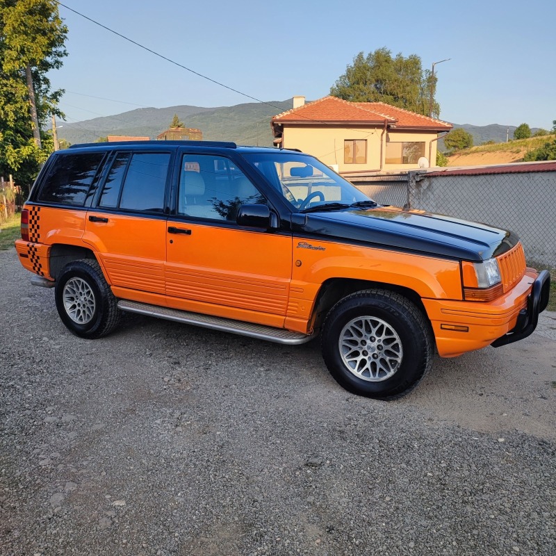 Jeep Grand cherokee 5.2 i * SWISS* TOP* , снимка 4 - Автомобили и джипове - 46529616