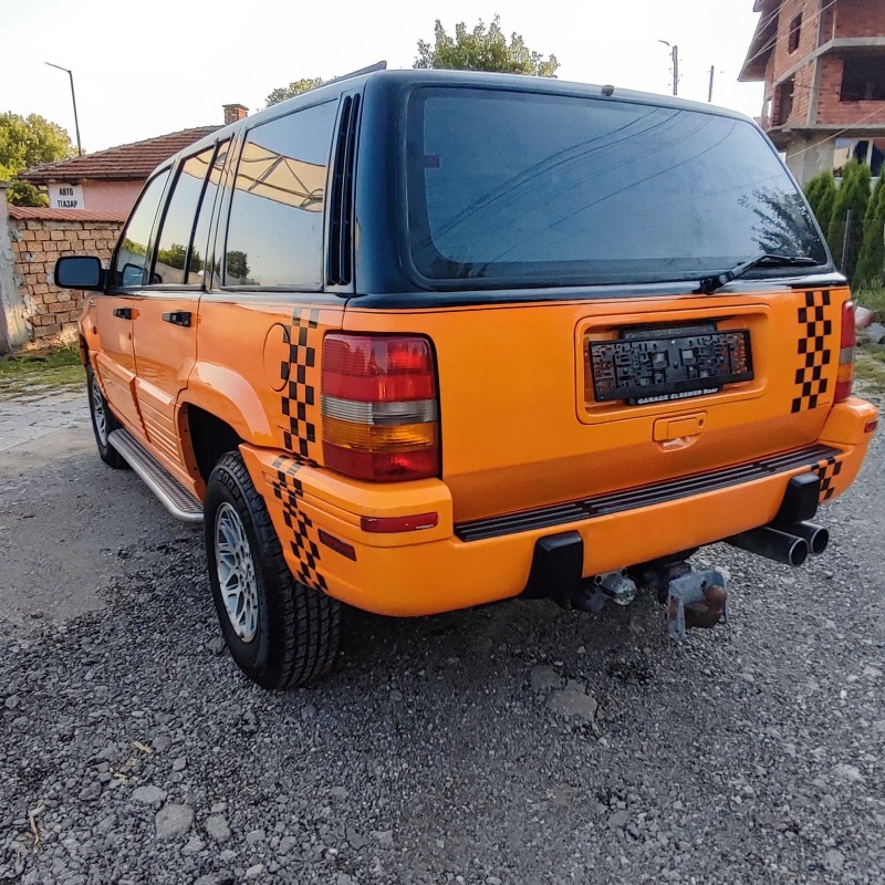 Jeep Grand cherokee 5.2 i * SWISS* TOP* , снимка 7 - Автомобили и джипове - 46529616