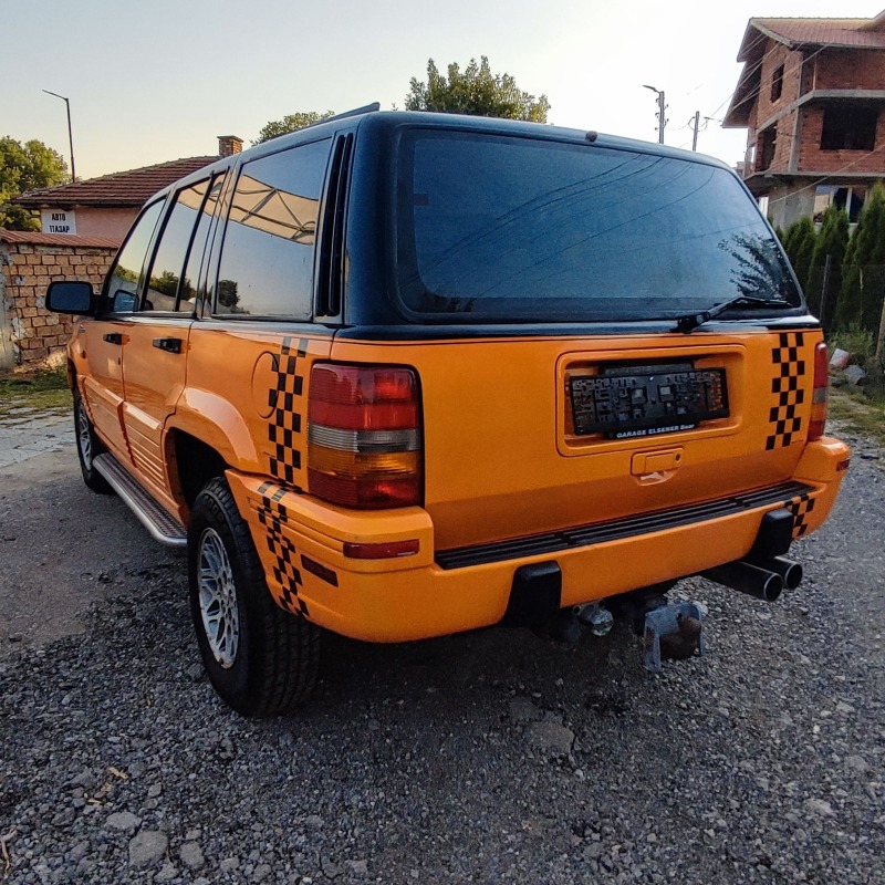 Jeep Grand cherokee 5.2 i * SWISS* TOP* , снимка 8 - Автомобили и джипове - 46529616