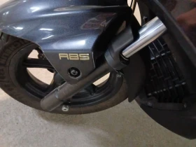 Kymco Downtown TOP състояние нови гуми Mishelin Реални 11400км, снимка 7