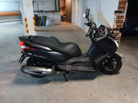 Kymco Downtown TOP състояние нови гуми Mishelin Реални 11400км, снимка 2